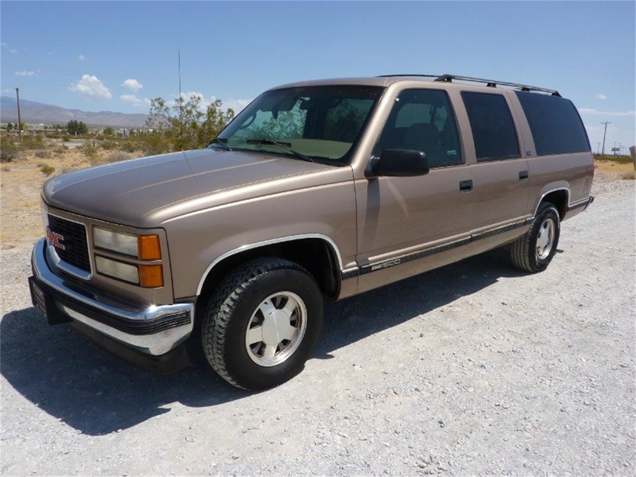 Gmc suburban. GMC Suburban 1995. Шевроле Субурбан 1995. Джип Шевроле Субурбан 1995. GMC Yukon 1995 Субурбан.