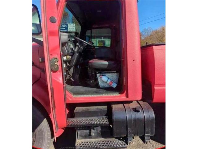 1999 International 4700 (CC-2112126) for sale in Cadillac, Michigan
